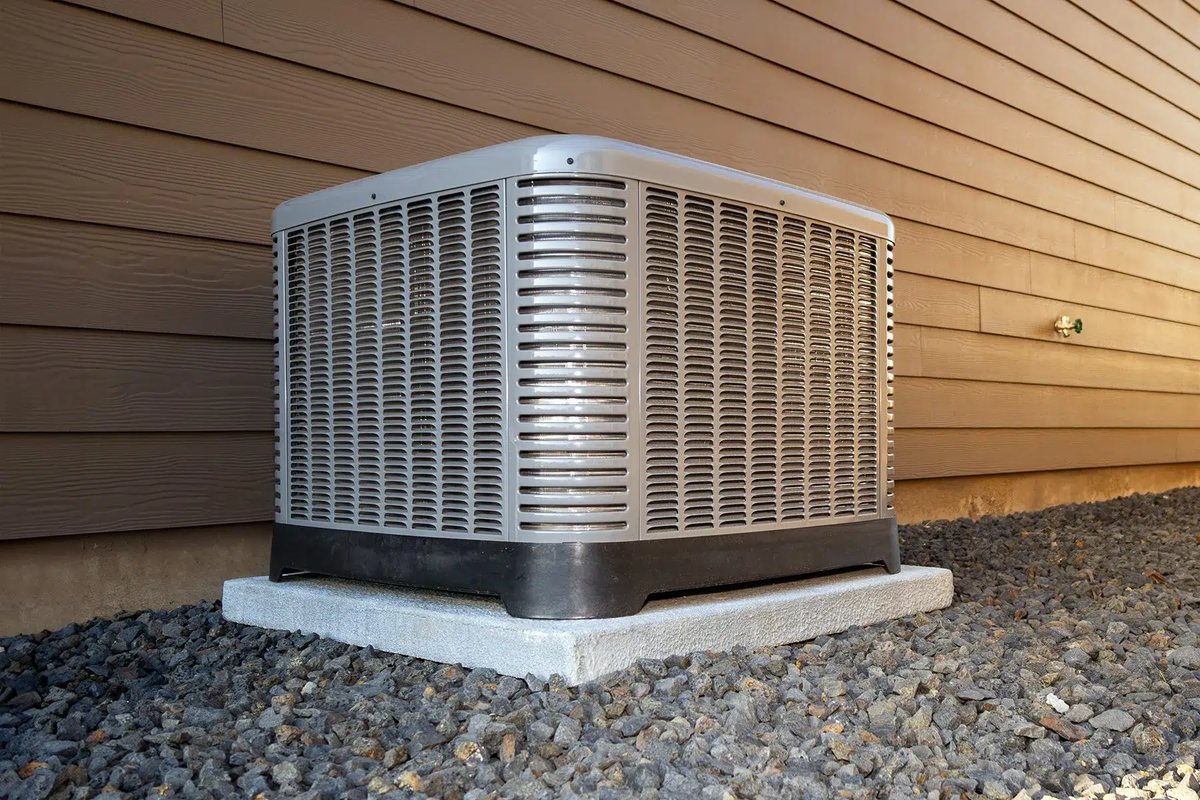 Heat pump outdoor unit installed at a home